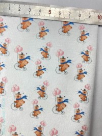 Мишка на велосипеде